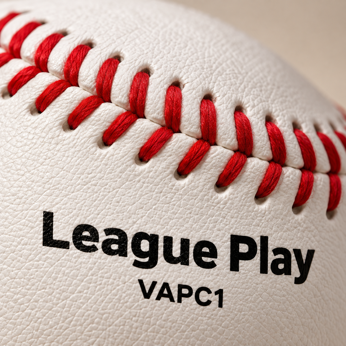 Macro of the VAPC1 cover showing the raised seam and the League Play stamp